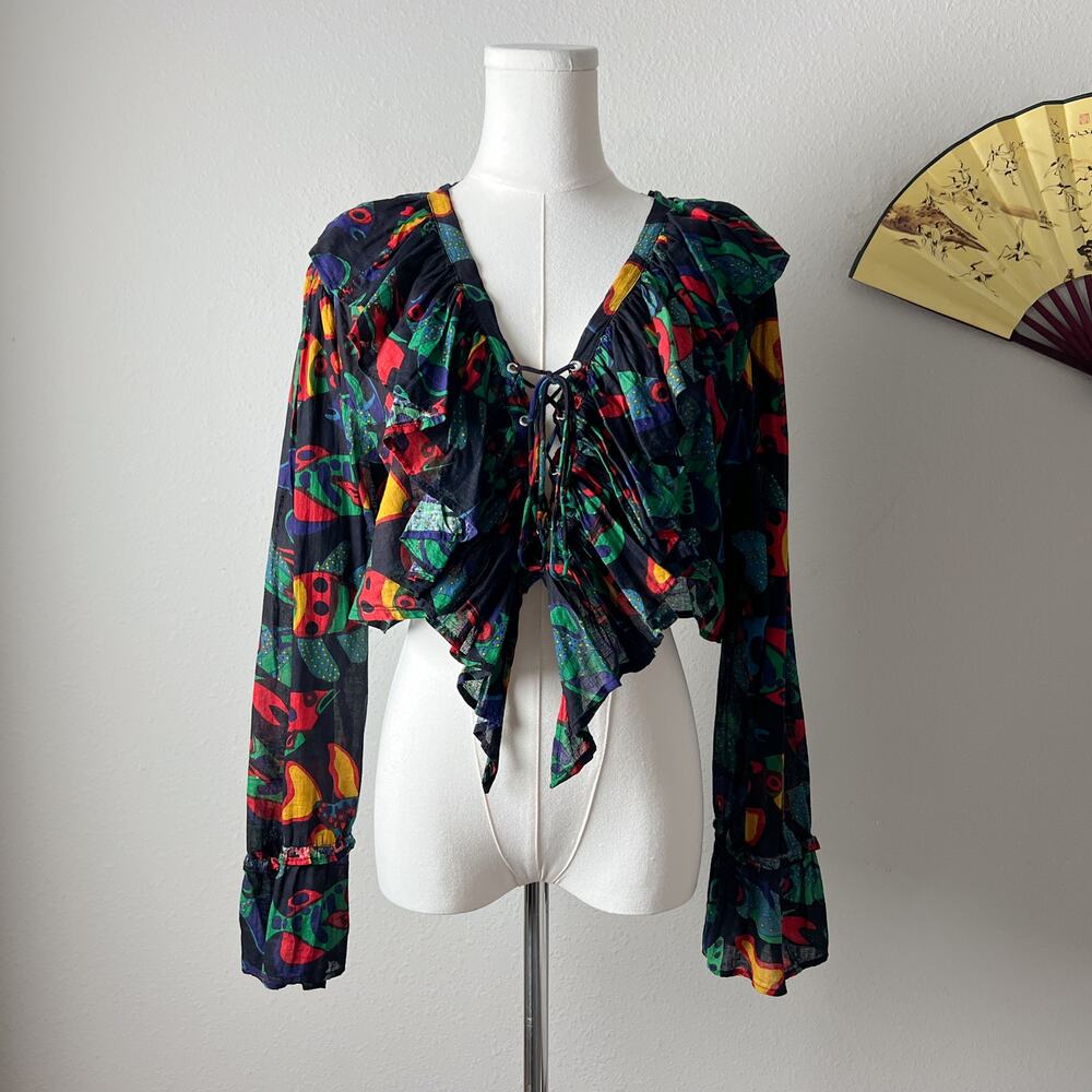 80s vintage black multicolor fish print ruffle trim lace up crop top blouse